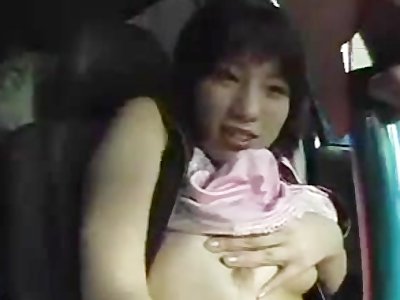 Shy Japanese Woman Shows Tits in Car.flv